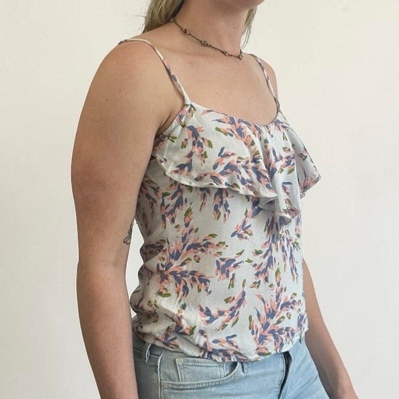 Kirra White Pastel Ruffle Front Tank Top