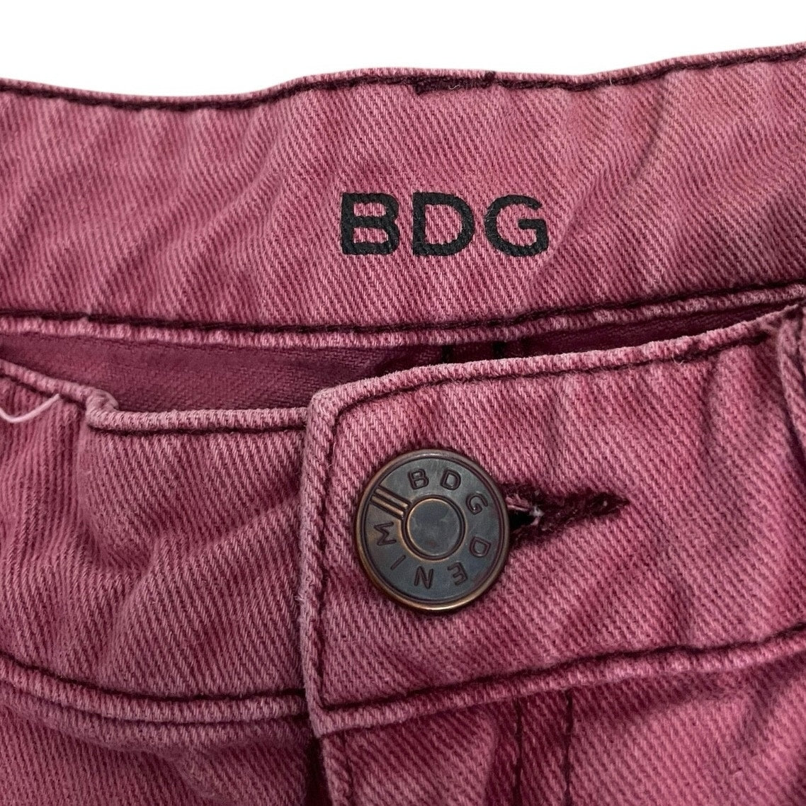 BDG Pink Distressed Low Rise Dolphin Mini Denim Shorts